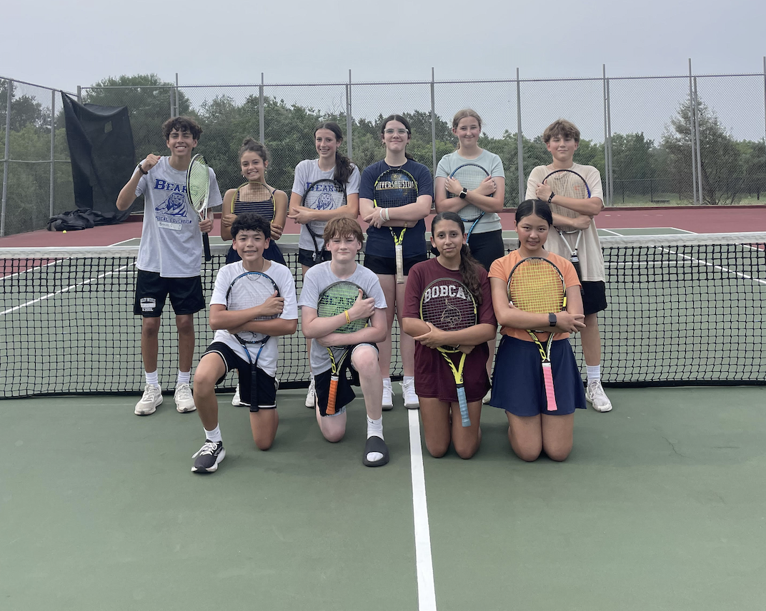 Bailey Middle School tennis team posing on outdoor tennis courts after net crank repair and center strap installation by Dobb Tennis Courts